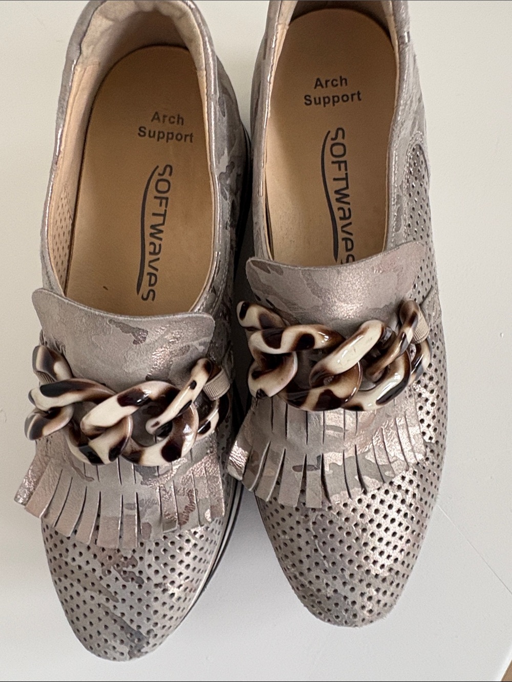 Softwaves Metallic Taupe Fringe Loafers with Decorative Chain